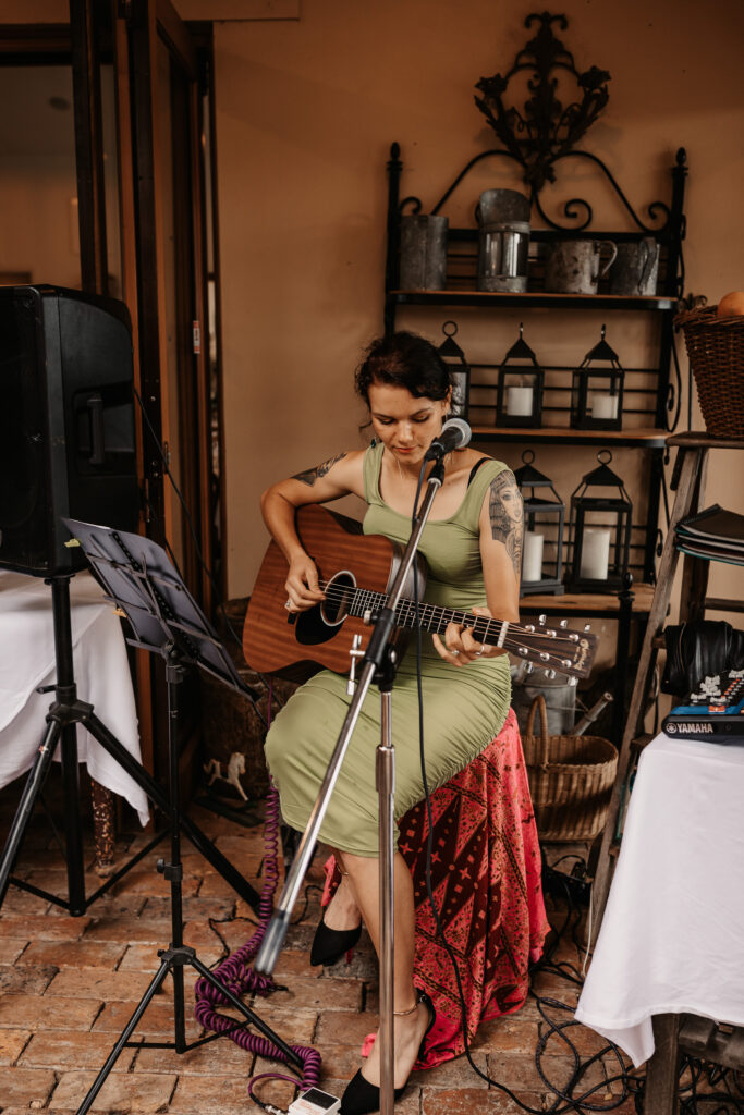 guitarist playing at a garden wedding in Newcastle
