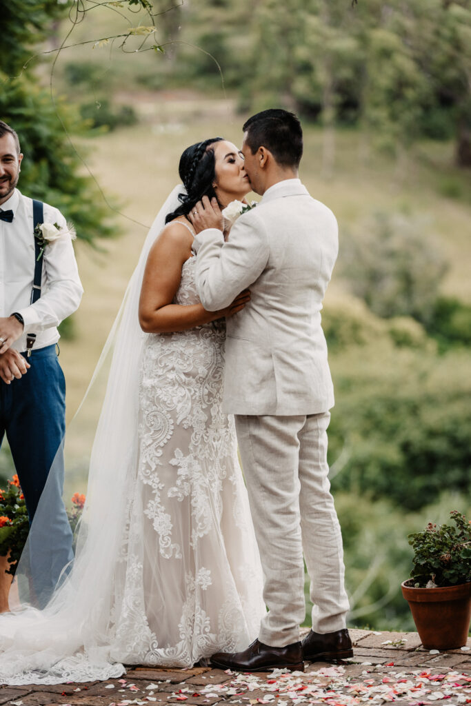 the first kiss of the husband and wife at their wedding