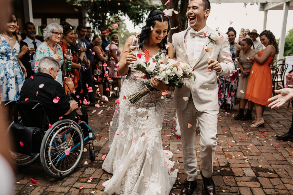 husband and wife exiting down the isle at a hunter valley wedding