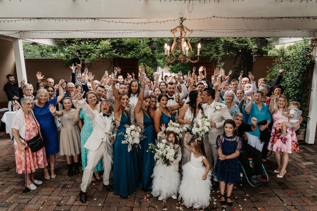 group photo of all the family and friends at a hunter valley wedding
