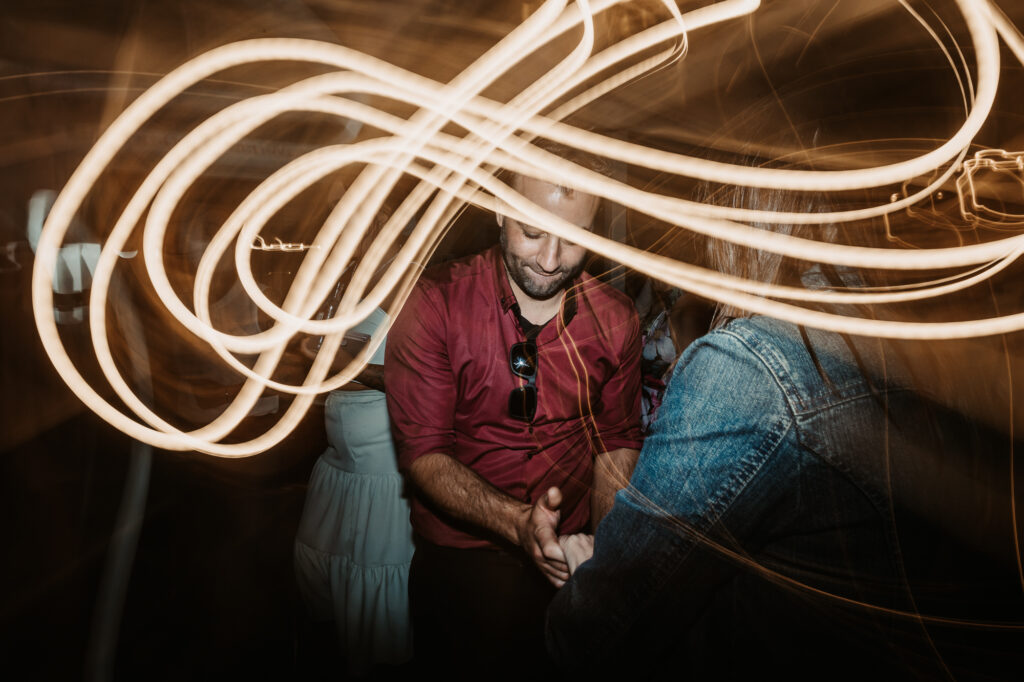 bridal party at the reception dancing