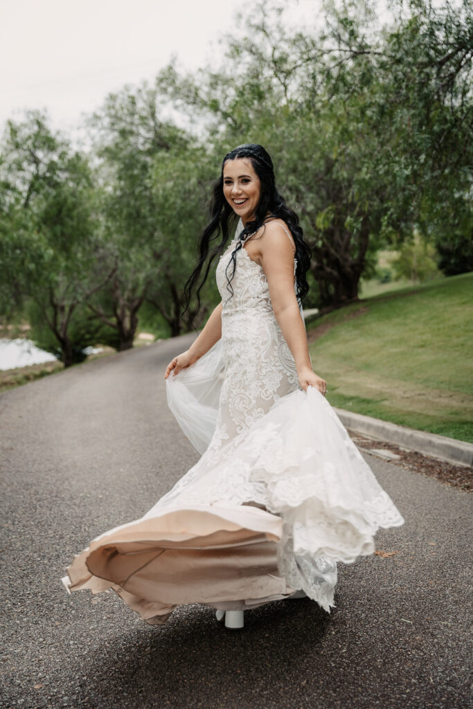 bride and her dress twirling around