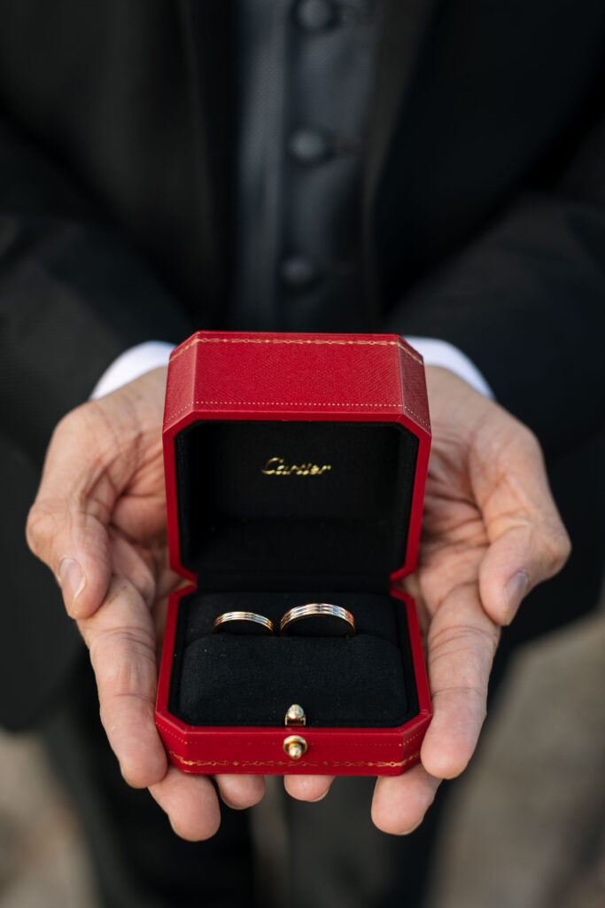 Wedding Rings in their box being held in the hand