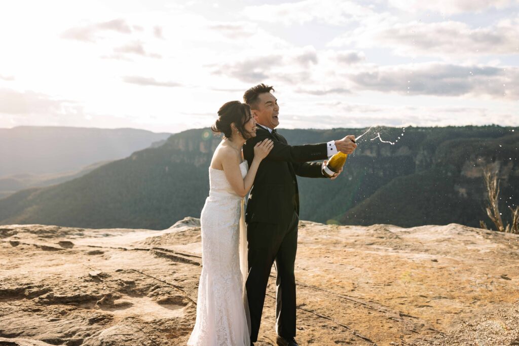Spraying the champaign at the top of the blue mountains, Engagement Session