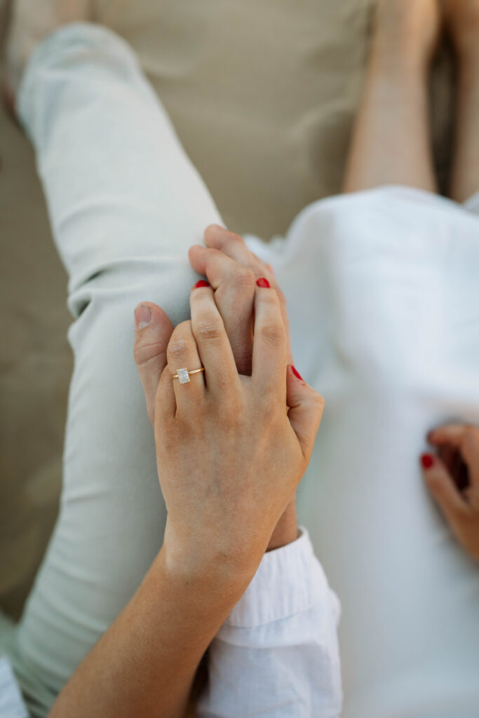Engagement session sunset at Stockton sand dunes.Engagement ring