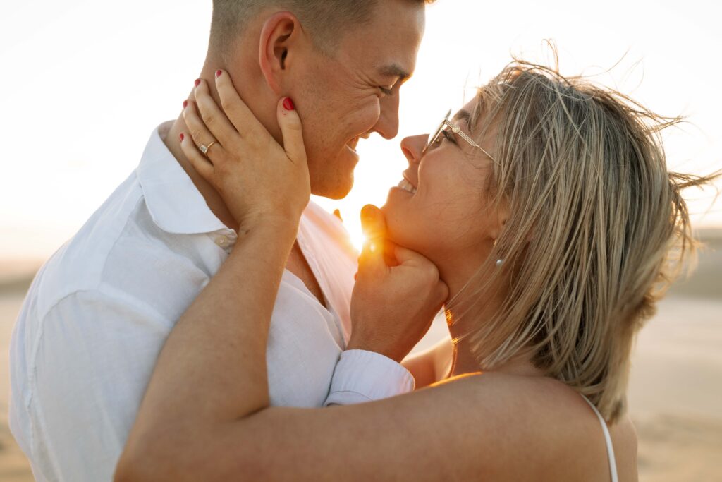 Engagement session sunset at Stockton sand dunes.