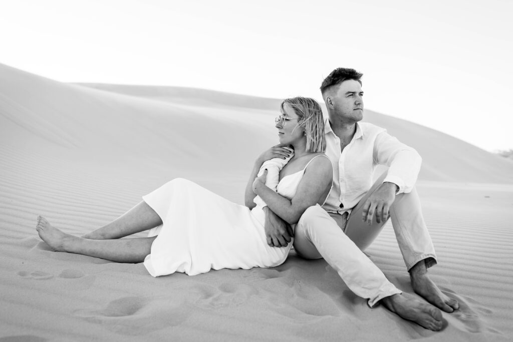 Engagement session sunset at Stockton sand dunes black and white photo