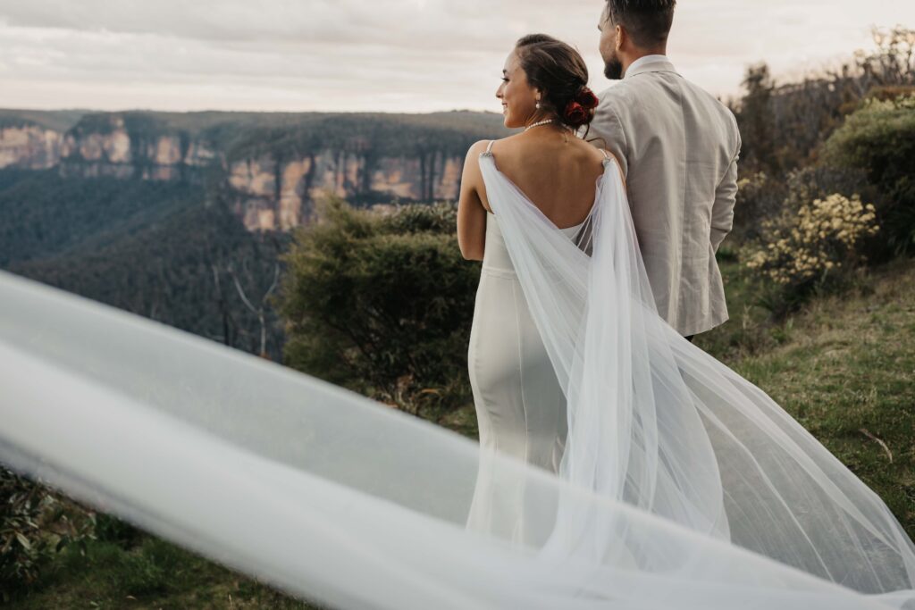 husband and wife looking out at the blue mountains, nsw