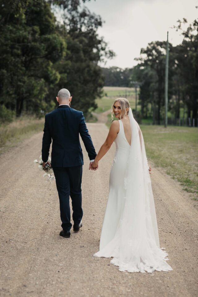 Bride looking back over her shoulder in the hunter valley