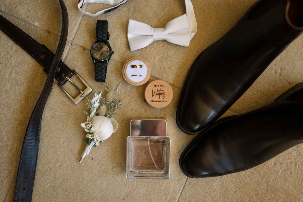 grooms accessories at bridal prep at a wedding