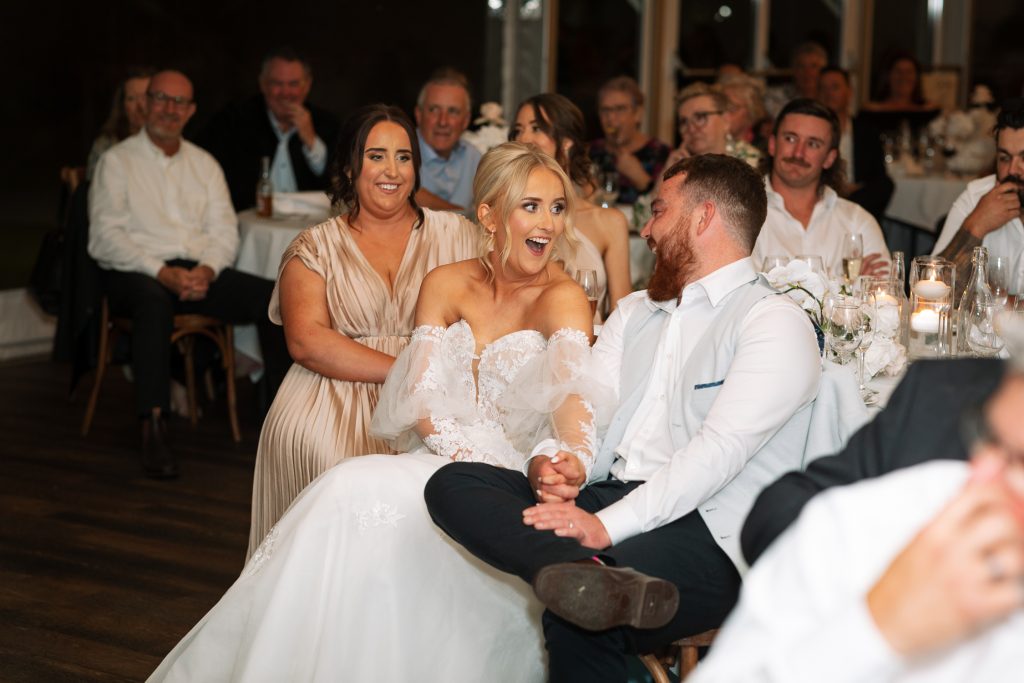 husband and wife reacting to a speech at a wedding in the hunter valley