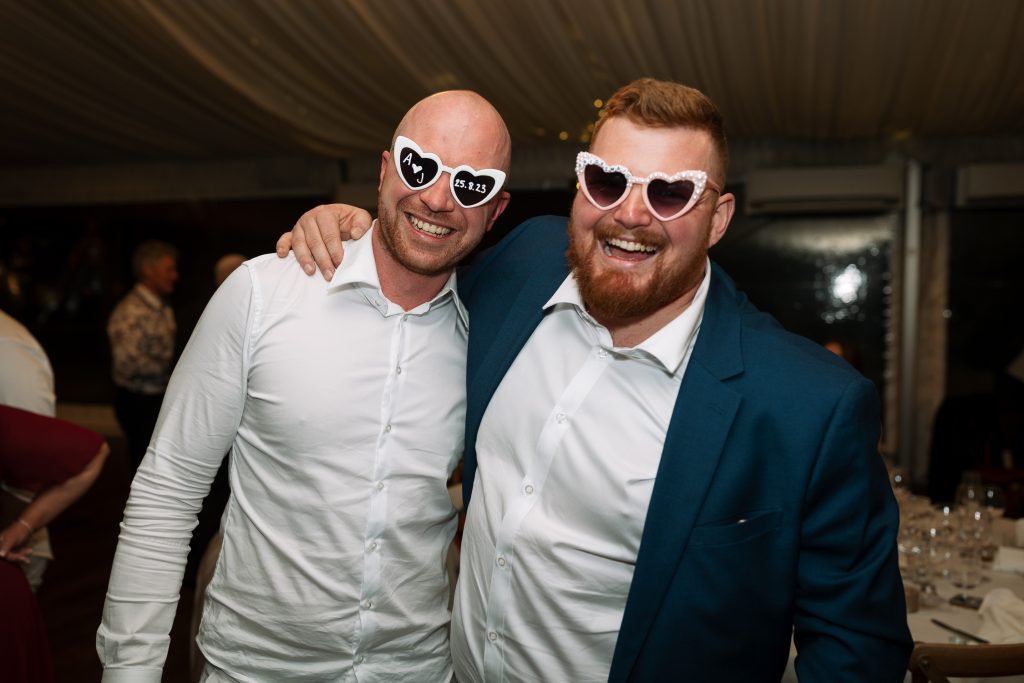 drunk guy guests at a wedding reception