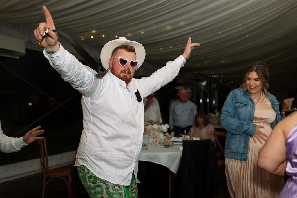 drunk guy guest at a wedding reception in the hunter valley