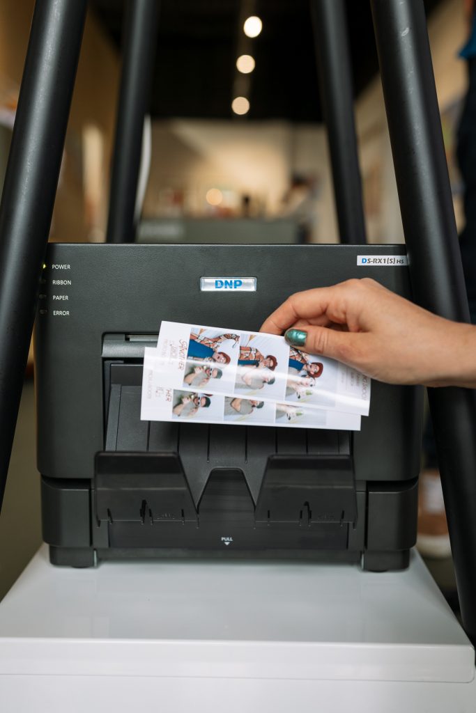 photo strips printed out from a Newcastle Photo Booth